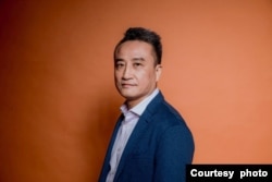 吴明德,香港金融界资深人士。