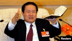 前中共政治局常委周永康(2011年3月12日资料照片)