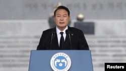 韩国总统尹锡悦2022年6月6日在阵亡将士纪念日发表讲话。(路透社)