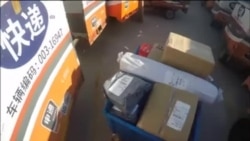 与时间赛跑:中国快递员在安全与收入之间寻找平衡 与时间赛跑:中国快递员在安全与收入之间寻找平衡