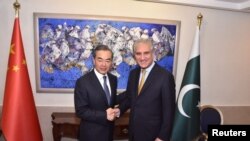 巴基斯坦外长库雷希在伊斯兰堡会晤到访的中国外交部长王毅(2018年9月8号)