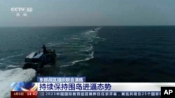在台湾总统蔡英文在美国与美国众议院议长凯文·麦卡锡举行会晤后,中共官媒央视播放中国海军舰只在台湾海峡举行军演的视频。(2023年4月9日)
