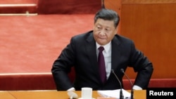 中国国家主席习近平在北京人大会堂参加纪念中国改革开放40年的纪念会。(2018年12月18日)