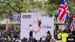 香港19日的天下制裁集会。照片来源:美国之音任新