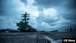 在南中国海执行例行任务的美国海军罗纳德.里根号航空母舰。(2021年6月14日)