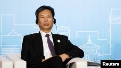 中国财政部长刘昆2018年5月28日在上海出席新开发银行(又称金砖国家开发银行)第三届年会。