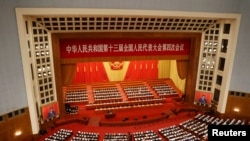 资料照:被称为橡皮图章的中国全国人大在北京人大会堂举行(2021年3月5日 路透社)