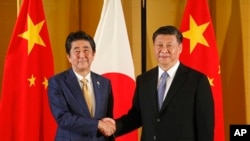 日本首相安倍晋三在大阪会见中国国家主席习近平(2019年6月27日)