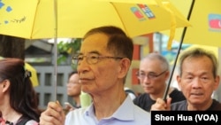 资料照片:民主党创党主席李柱铭出现在游行队伍中。(2019年5月26日)