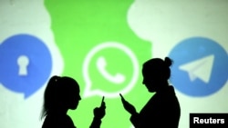 港人利用加密通讯软件 Telegram “电报”平台, 寻求国际支援。加密通讯平台Telegram的标识是一只纸飞机。(2018年3月28日资料照片)