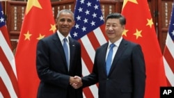 2016年9月3日美国总统奥巴马(左)和中国国家主席习近平在中国杭州全球经济峰会上举行双边会谈前握手。