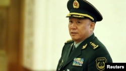 2014年3月10日,中国武警部队司令员王建平在北京开会