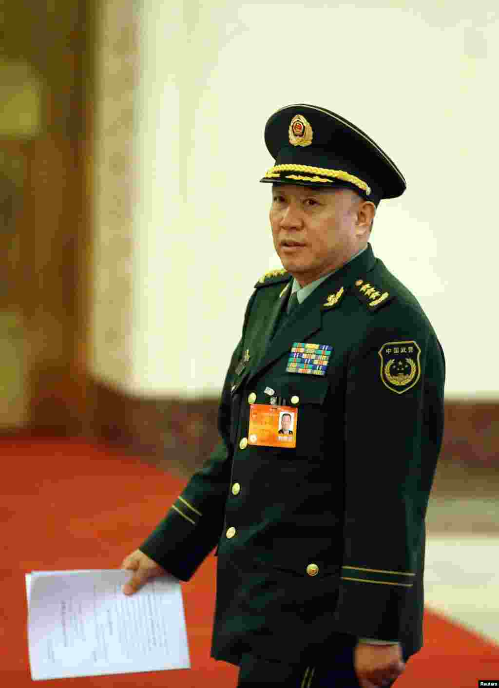 2014年3月10日,中国武警部队司令员王建平在北京开会。 2016年11月29日, 中国国防部新闻发言人杨宇军说,王建平因涉嫌受贿犯罪,被中国军事检察机关立案侦查。王建平被认为是已经落马的前中共中央政法委书记周永康的亲信。他担任武警部队司令员时,周永康是他的直接上司。王建平也是中共“十八大”后中国军警系统首位落马的现役上将,此前落马的中国中央军委副主席徐才厚、郭伯雄以及原空军政委田修思等虽是上将军衔,但是被查时都已经退役。此前,10月27日晚间播出的中央电视台《新闻联播》用29分钟报道中共十八届六中全会,镜头逐一扫过按姓氏笔画数而坐的197名中央委员,画面上未出现中央委员和军委联合参谋部副参谋长王建平上将。此前,8月26日,香港南华早报声称王建平于8月25日在四川成都视察期间被军方纪检人员带走,其妻子及秘书则于同日在北京被带走。南华早报引用知情人士的消息说,王建平因为违反党纪被带走。