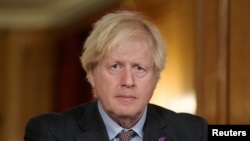 英国首相鲍里斯·约翰逊在首相官邸参加疫情视频会议。(2021年1月27日)
