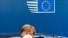 German Chancellor Angela Merkel wears a protective face mask as she arrives for the continuation of an EU summit meeting in Brussels, Belgium, July 20, 2020.