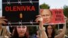 Фото: акція протесту в Києві, 30 липня 2022 року REUTERS/Валентин Огіренко