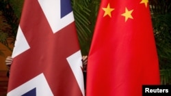 资料照片:中英国旗。
