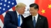 资料照片:在日本大阪举行的二十国集团(G20)领导人峰会上,时任美国总统唐纳德·特朗普与中国国家主席习近平在双边会谈开始时举行会晤。(2019年6月29日)