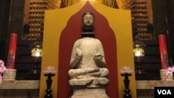 佛首金身合璧后供奉在佛光山大雄宝殿-(佛光山佛陀纪念馆提供)