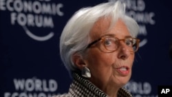国际货币基金组织总裁克里斯蒂娜·拉加德(Christine Lagarde)周一在瑞士达沃斯的世界经济论坛上发表讲话(2018年1月22日)