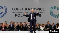COP24联合国气候变化会议达成协议 主席库尔提卡高兴得跳了起来(路透社)