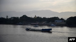 မဲခေါင်မြစ်တဖက်မြင်တွေ့ရတဲ့ လာအိုနိုင်ငံထဲက ရွှေတြိဂံဒေသအထူးစီးပွားရေးဇုံ (စက်တင်ဘာ ၂၀၊ ၂၀၁၉)