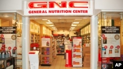 上海光明集团并购美国保健营养品连锁商健安喜(GNC) 接近达成协议,但中国公司在美国的其他并购屡遭挫折