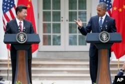 美国总统奥巴马与中国国家主席习近平在白宫记者会上(2015年9月25日)