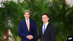 美国气候问题特使约翰·克里(John Kerry)2023年7月在北京会见中国国家副主席韩正。(路透社)