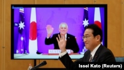 日本与澳大利亚1月6日签署了加强安全领域合作的《互惠准入协定》(RAA)。(路透社照)