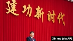 资料照:中国领导人习近平在全国政协新年茶话会上发表讲话。(2021年12月31日)