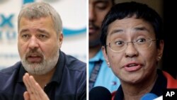 2021年诺贝尔和平奖得主德米特里•穆拉托夫(左)和玛丽亚•雷沙