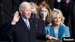 သမ္မတသစ်အဖြစ် Joe Biden ကျမ်းသစ္စာကျိန်ဆို (သတင်းဓါတ်ပုံ)