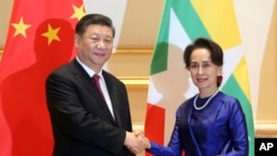 2020年1月17日,中国国家主席习近平在内比都会见缅甸国务资政昂山素季。
