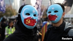 香港抗议者举行集会支持新疆维吾尔穆斯林的人权。(2019年12月22日)