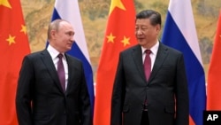 资料照:2022年2月4日,中国国家主席习近平在北京与俄罗斯总统普京举行会晤。