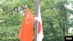 (资料照)中国总理李克强访日令东京街头8年来重现日中国旗
