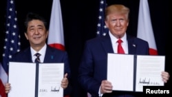 在纽约举行的第74届联合国大会期间,日本首相安倍晋三和美国总统特朗普在双边会议上发表联合声明(2019年9月25日)。