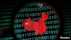 资料照:电脑屏幕显示的放大镜下的中国地图