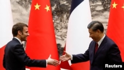 法国总统马克龙2023年4月6日在访问北京时与中国国家主席习近平会面。(路透社)