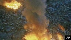 日本大地震发生后,岩手地区的建筑物在燃烧