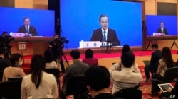 中国外长王毅在全国人大会议视频记者会上讲话。(2020年5月24日)