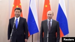 中国国家主席习近平和俄罗斯总统普京(2014年2月6日资料照片)