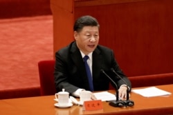 资料照片: 中国国家主席习近平在北京人民大会堂举行的“纪念辛亥革命110周年大会”上发表讲话。(2021年10月9日)