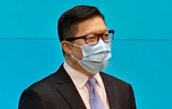 警务处处长邓炳强升任保安局局长,首位警察背景升任政务司司长的李家超,被香港传媒形容为“警察政府” (美国之音汤惠芸)