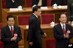 2009年胡锦涛、温家宝和李克强出席中国人大会议。(2009年3月13日)
