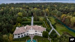 This Oct. 6, 2019, photo shows the house of Mykola Zlochevsky, near Kyiv, Ukraine, owner of the gas company Burisma that hired Hunter Biden in 2014.