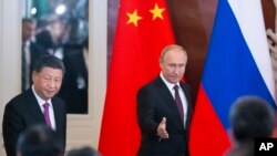 资料照:俄罗斯总统普京和中国国家主席习近平在俄罗斯莫斯科的克里姆林宫会谈。(2019年6月5日)