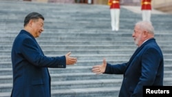中国国家主席习近平在北京人民大会堂举行仪式欢迎巴西总统卢拉访问。(2023年4月14日)