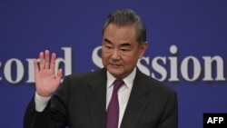中国外长王毅星期四(3月7日)在中国第十四届全国人大二次会议外交记者会上。
